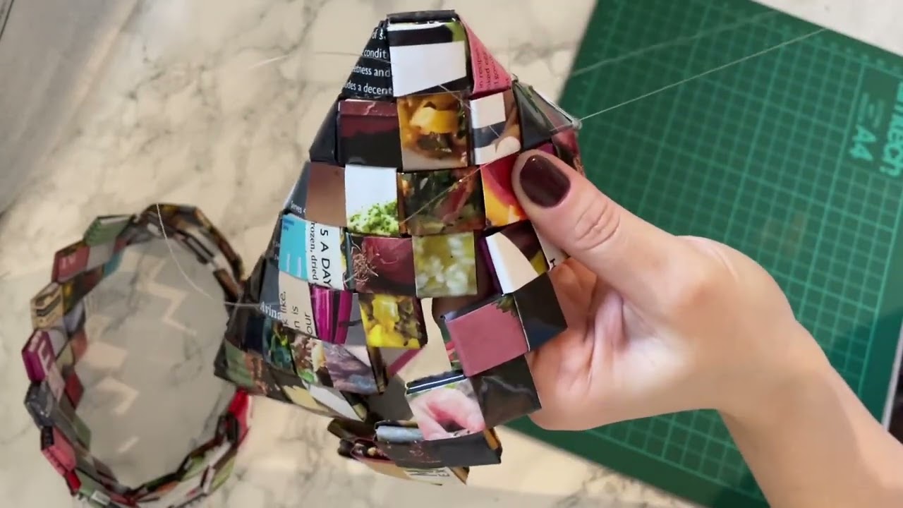 Paper magazine wallet. Sweing . 