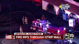 An investigation is underway as a fire ripped through strip mall in
apache junction on wednesday evening.
