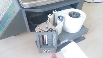 Cách lắp giấy in cho cân điện tử in tem nhãn - Tem Cân Điện Tử