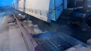 Unloading a wagon with stones