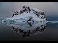 Incredible midnight sunset over Lemaire Channel in Antarctica, in 4K