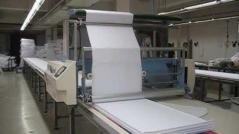 OSHIMA Tubular Fabric Spreading Machine: Perfect for Seamless Knitted Fabrics
