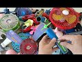 unboxing a pile of old toys full of mini fans and homemade fans - all of them run strong