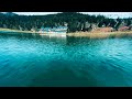 A bird flies over the lake of Payolle | Lac de Payolle | Hautes-pyrénées | France