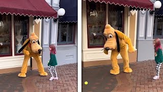 Toddler Plays Fetch With Pluto At Disney