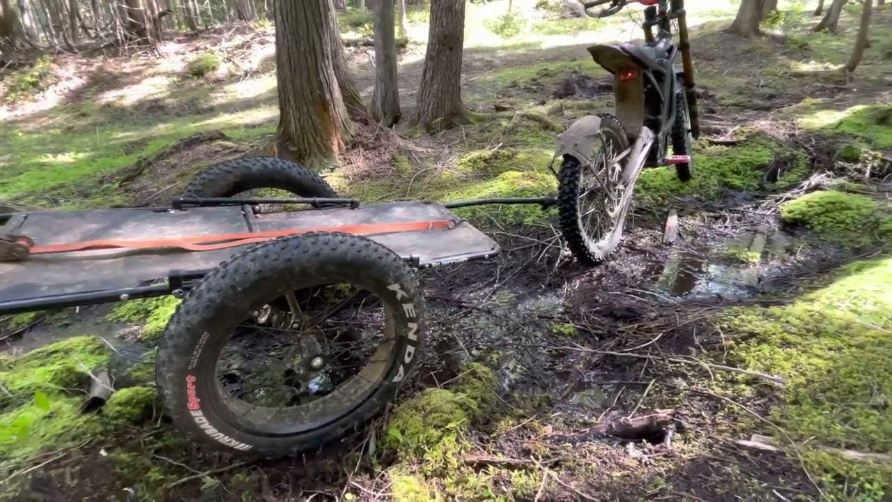 Sur Ron XX with Quiet Kat trailer