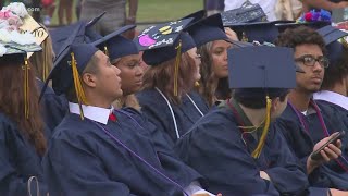 U.S. Secretary of Education Miguel Cardona speaks to  Meriden's Platt High School graduating class