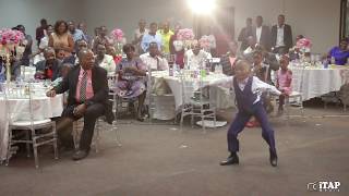 Young boy dances to Baba Harare's 