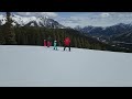 Саша катается на горных лыжах. Sasha is downhill skiing.