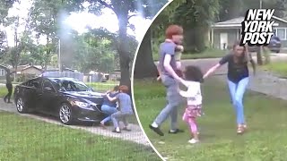 Carjackers seen in shocking video opening fire on family while trying to steal car with kids inside