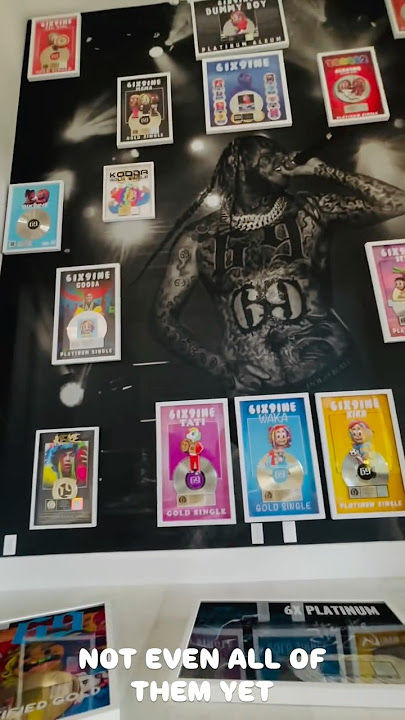 6ix9ine shows off even more new music record plaques added to his collection