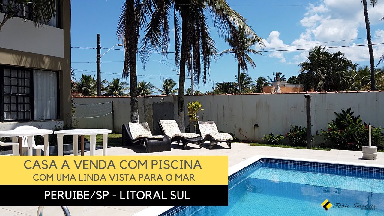 CASA A VENDA FRENTE AO MAR COM PISCINA EM PERUIBE/SP - FÁBIO IMOVEIS