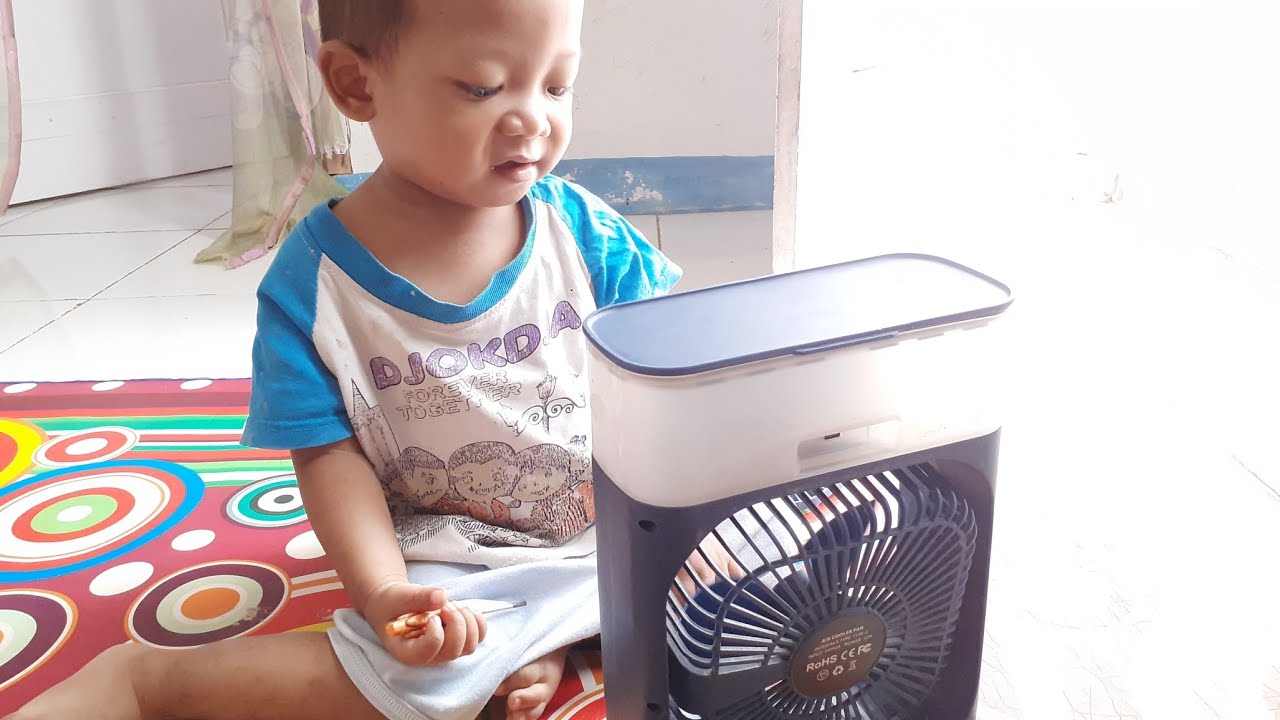 Lagi perbaiki kipas angin ac potabel 