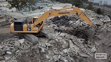 Komatsu PC490LC & Kleemann Mobirex - A Perfect Pairing - Asphalt Contractors Inc. - Roland Machinery