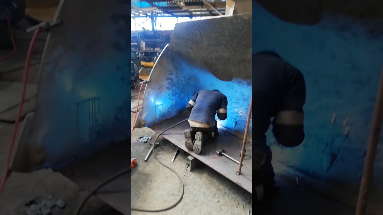 MIG WELDING PROCESS IN RESTORING EXCAVATOR'S BUCKET IN MECHANICAL WORKSHOP PRIOR RESPRAY