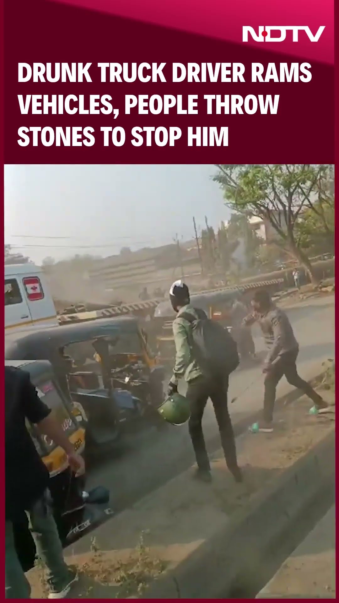 Drunk Truck Driver Rams Vehicles, People Throw Stones To Stop Him