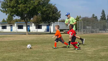 3 year olds get in fight during soccer game...   watch to the end!