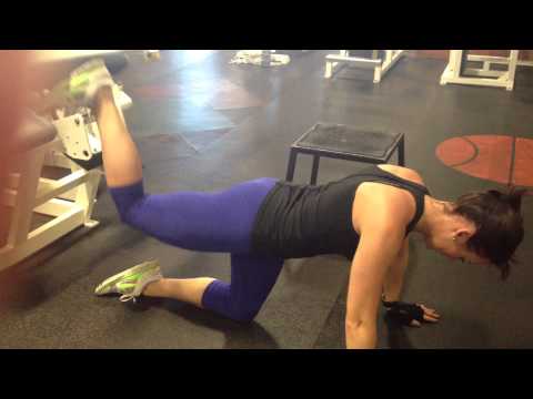 Reverse kick backs on hamstring curl machine