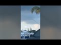 Skinny Spinning Waterspout Stretches High 'up Into The Clouds' on Florida Coast