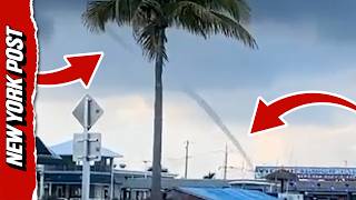 Skinny Spinning Waterspout Stretches High 'up Into The Clouds' on Florida Coast