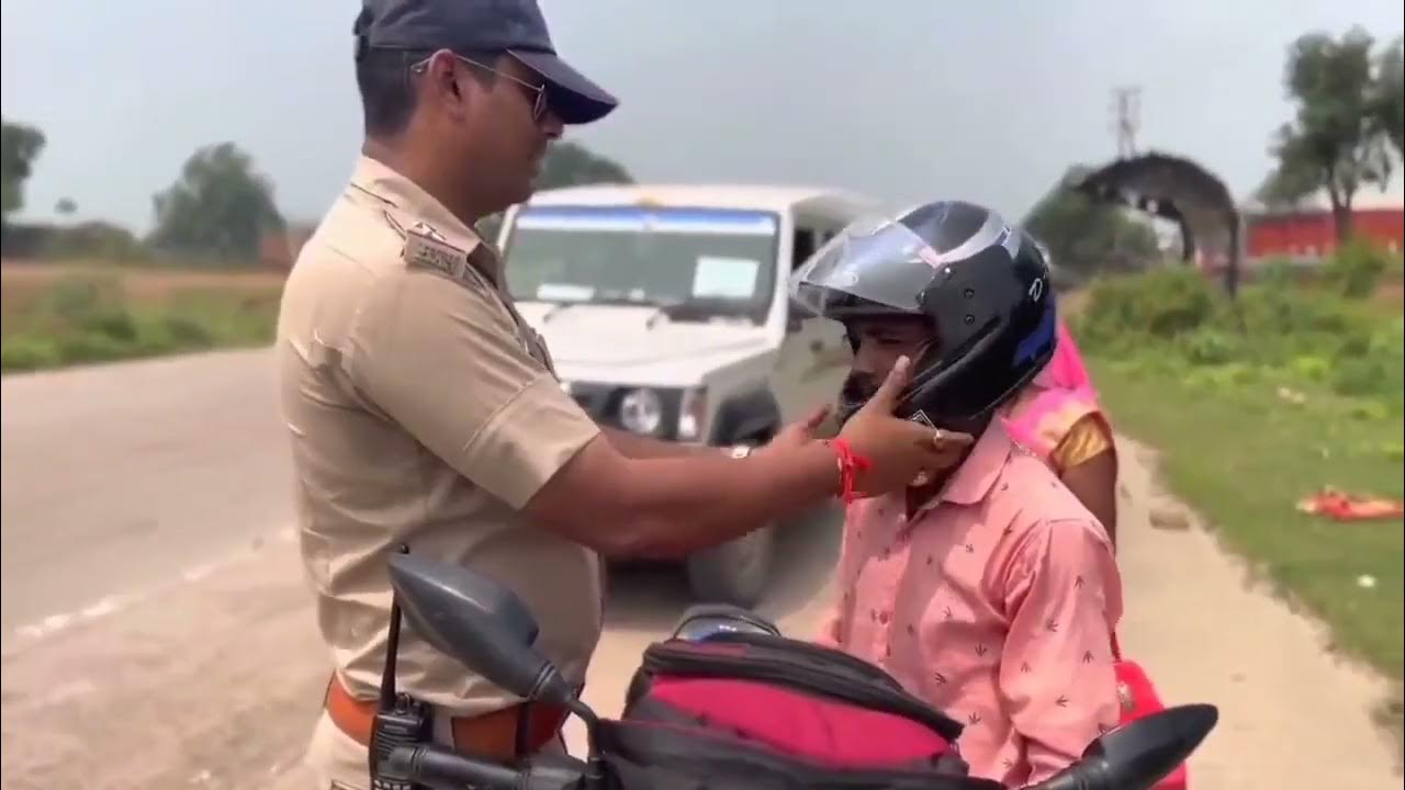 Viral Video Police Officer Responds to Man Riding Bike Without Helmet