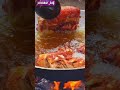 cooking meat in the village
