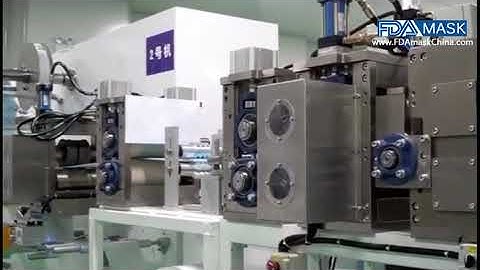 Running video of high speed 700 pcs per minute mask nonwoven disposal making machine