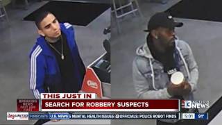 Two suspects wanted for robbing man at fast food restaurant