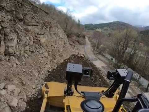 კლდის გრუნტის მოჭრა ბულდოზერით