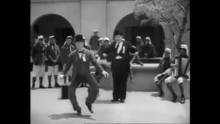 Laurel and Hardy dance to Boys Keep Swinging by David Bowie