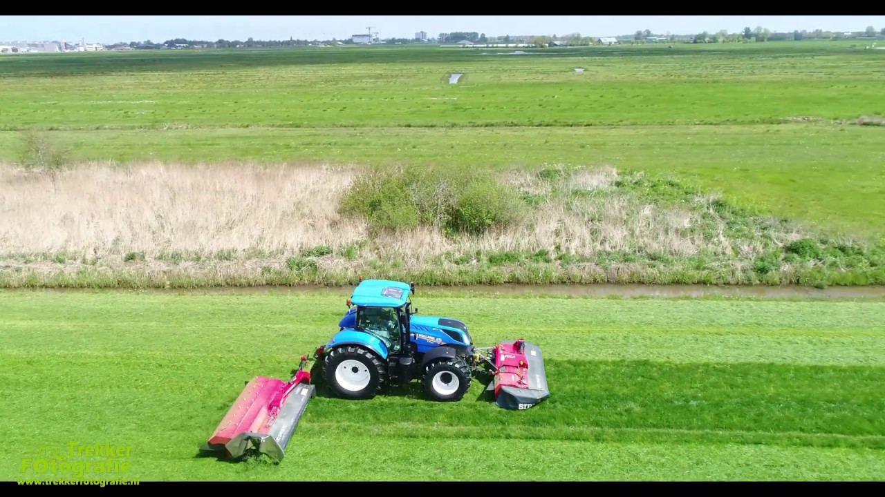 Loonbedrijf Maurice Land aan het maaien met 2 combinaties