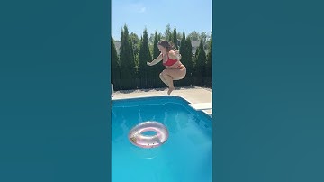 Cannonball Tuck Jump into Floating Tube in Swimming Pool #shorts
