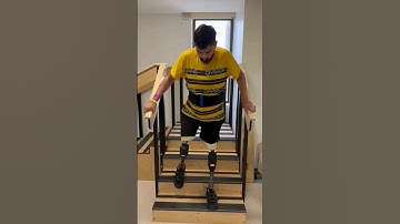 bilateral above knee prosthetics 🦵  going down stairs #bilateralamputee #prosthetics #amptuee