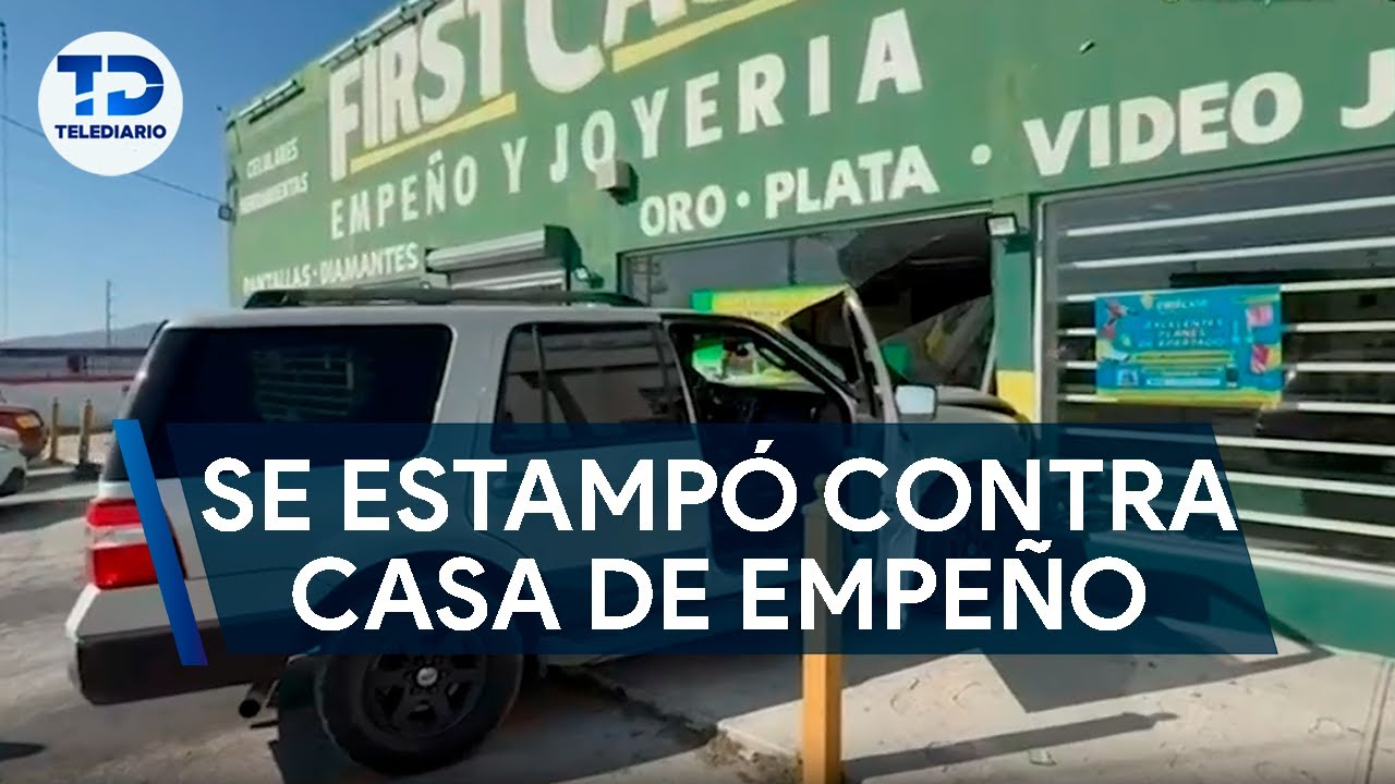 Conductor de camioneta se estampó contra una casa de empeño - YouTube