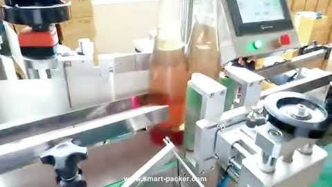 Fruit vinegar glass bottle automatic positioning labeling machine label applicator line