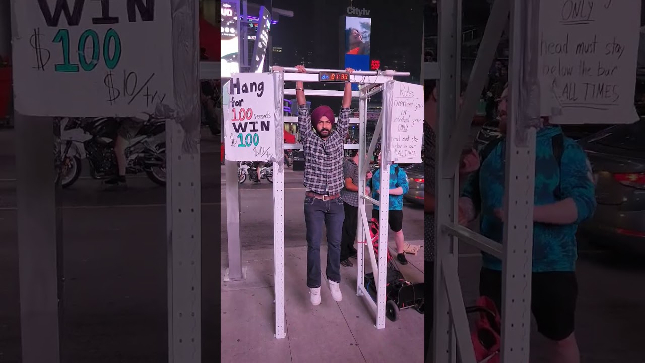 Easy money.  Hang for 100 seconds - win 100$ at Dundas Square,  Toronto.