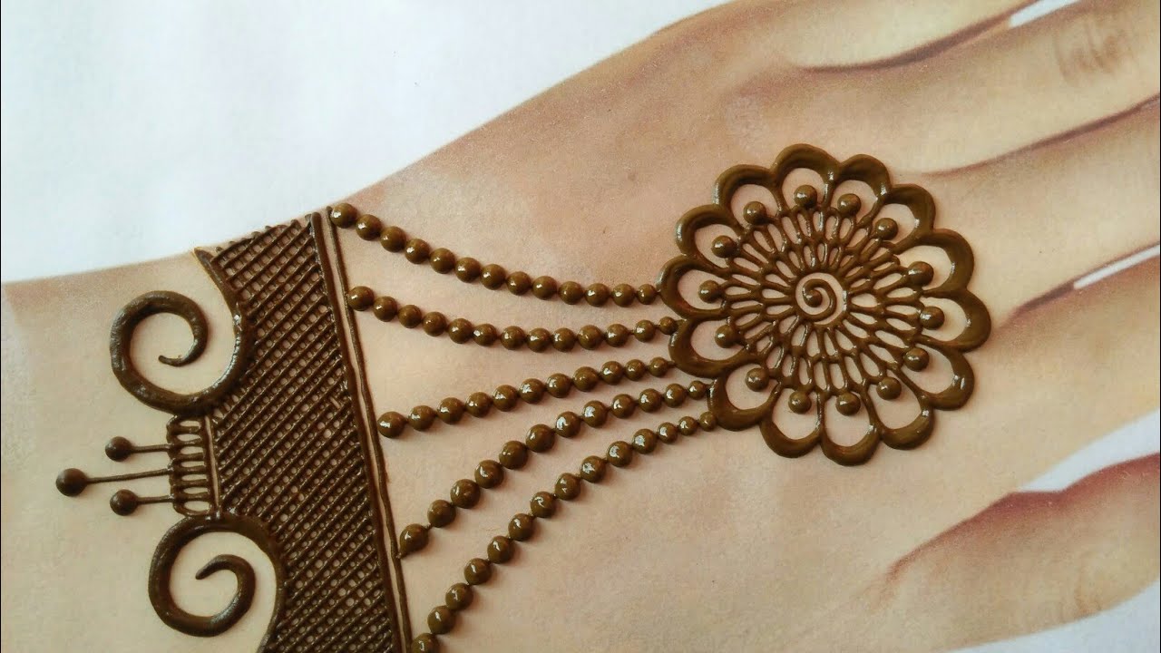 Latest chain style jewellery mehndi design for back hands Navratri