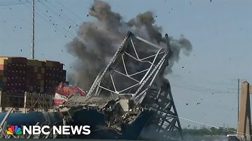 Section of Baltimore bridge brought down in controlled explosion