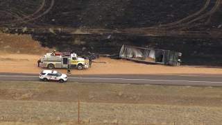 Head-on crash near Byers sparks grass fire