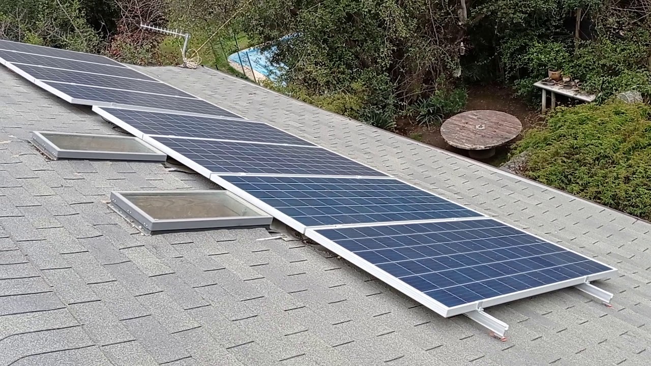 Instalacion paneles sobre techo - YouTube