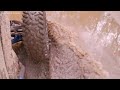 Splashing through the mud in our Polaris Pro R.
