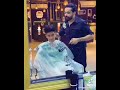سامر المدني عند الحلاق 