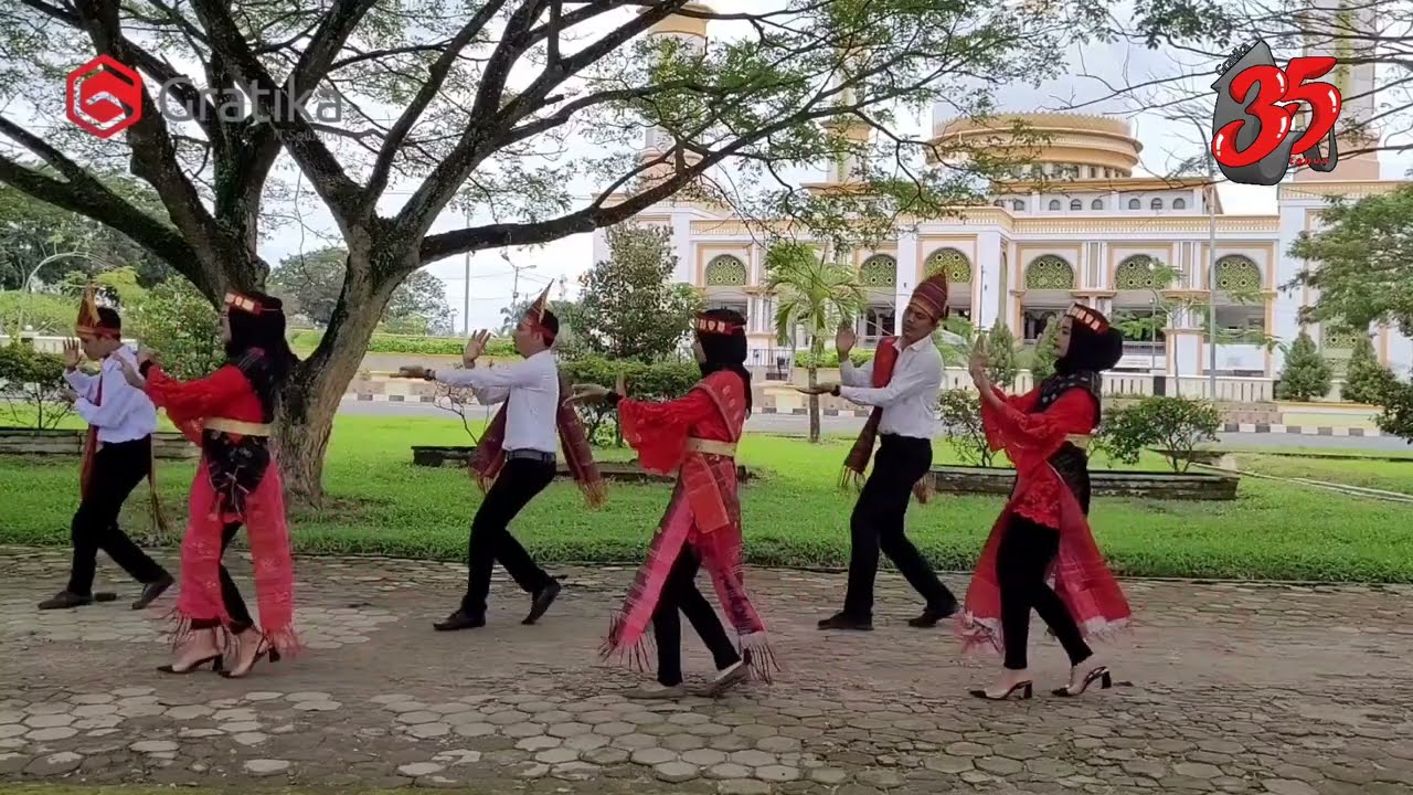 GRATIKA ASAHAN - Persembahan Tor-Tor Sinanggar Tulo HUT GRATIKA ke 35 Tahun dari Team AD Kisaran