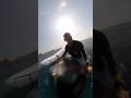 Windsurfer is hit and pulled under water by a humpback whale! #shorts