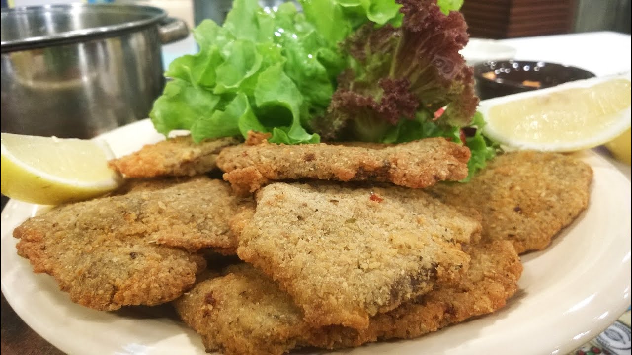 Milanesa de lengua y lengua a la vinagreta criolla