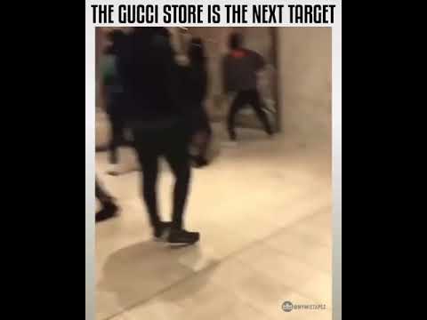 looting protesters break into a Gucci store in Atlanta