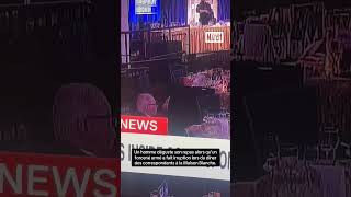 A man enjoys his meal as shots ring out at the White House