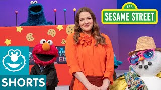 drew barrymore plays dress a snowman the not too late show with elmo