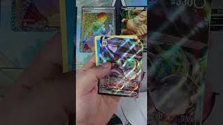 Peeling a Secret Ditto and finding a VMAX in the same pack of Pokémon GO!