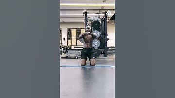 Man Overcomes Obstacle Bar in Clean High Jump